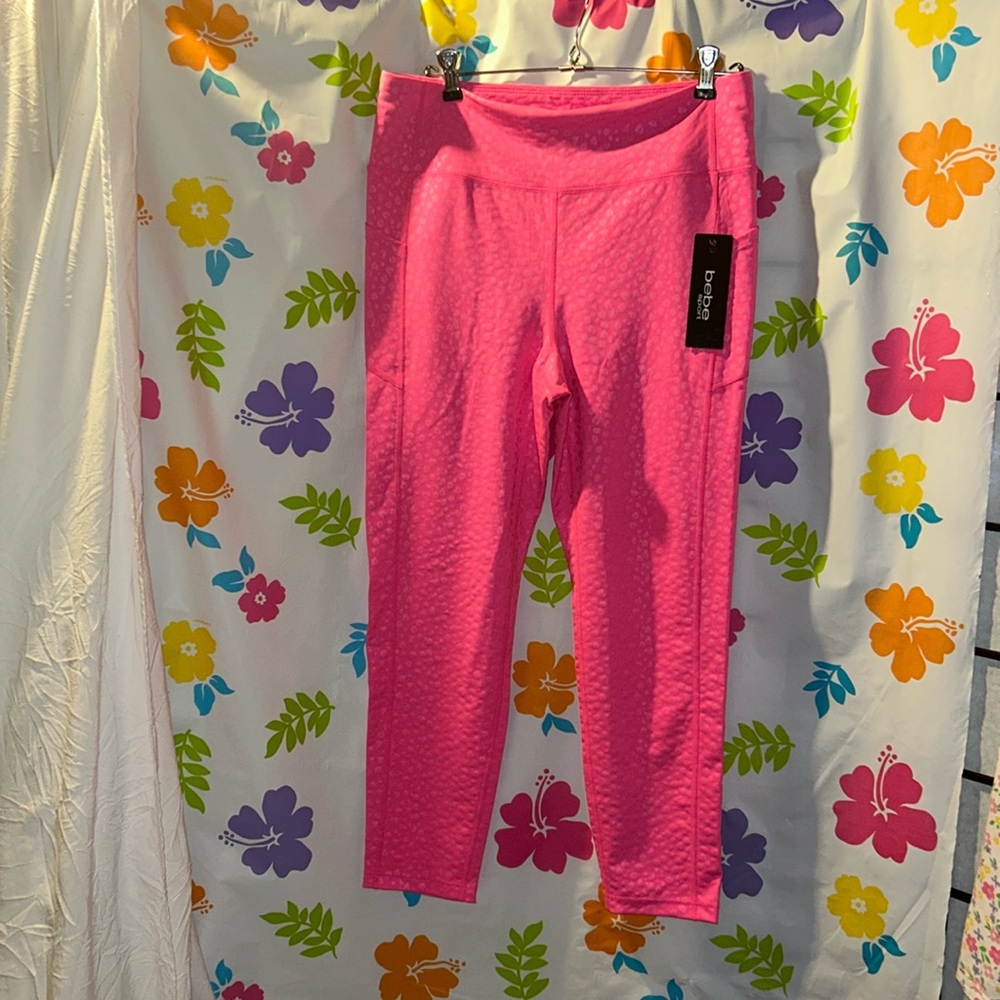 Bebe sport workout pants   Hot pink with side leg pockets. NWT size large